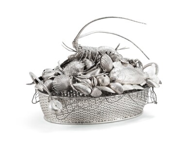 View full screen - View 1 of Lot 12. A large Italian silver centretable shaped as a fishing basket, Mario Buccellati, circa 1960 | Grand centre de table en forme de panier de pêche en argent par Mario Buccellati, Milan, vers 1960.