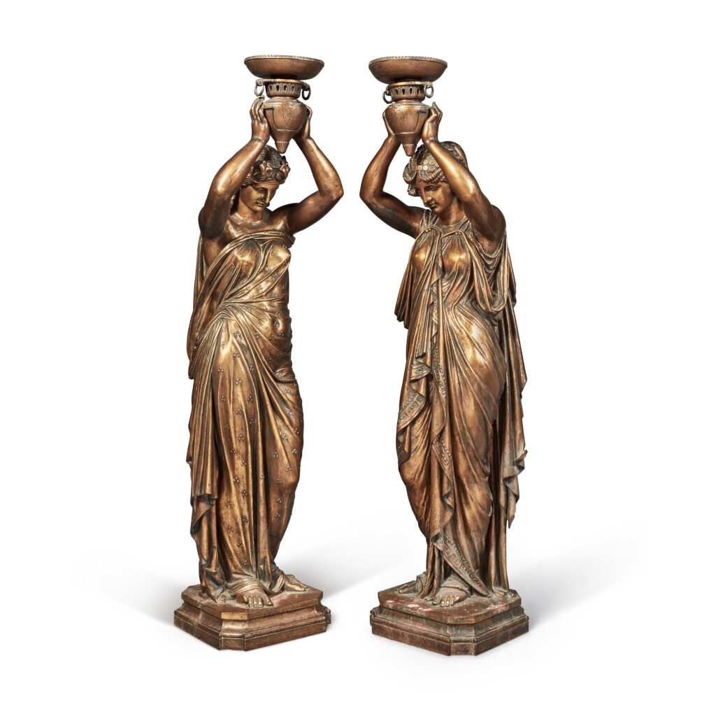 View full screen - View 1 of Lot 694. A Pair of French Life-Sized Gilt-Iron Figural Torchères, By J.J. Ducel et Fils, Paris, Third Quarter 19th Century.