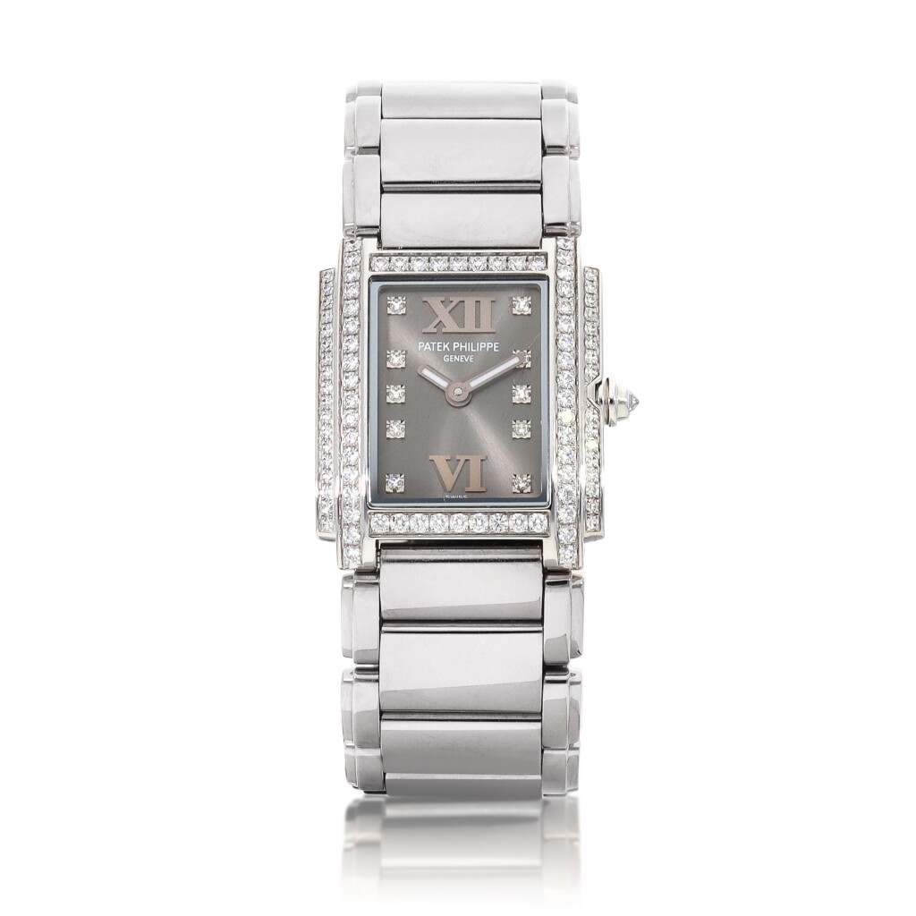 View full screen - View 1 of Lot 8065. Twenty~4, Reference 4908 | A white gold and diamond-set wristwatch with bracelet, Circa 2010 | 百達翡麗 | Twenty~4 型號4908 | 白金鑲鑽石鏈帶腕錶,約2010年製.