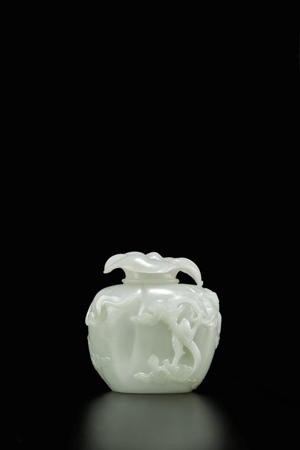 View full screen - View 1 of Lot 371. A rare pale celadon jade 'treasure sack' vase, Qing dynasty, Qianlong period.