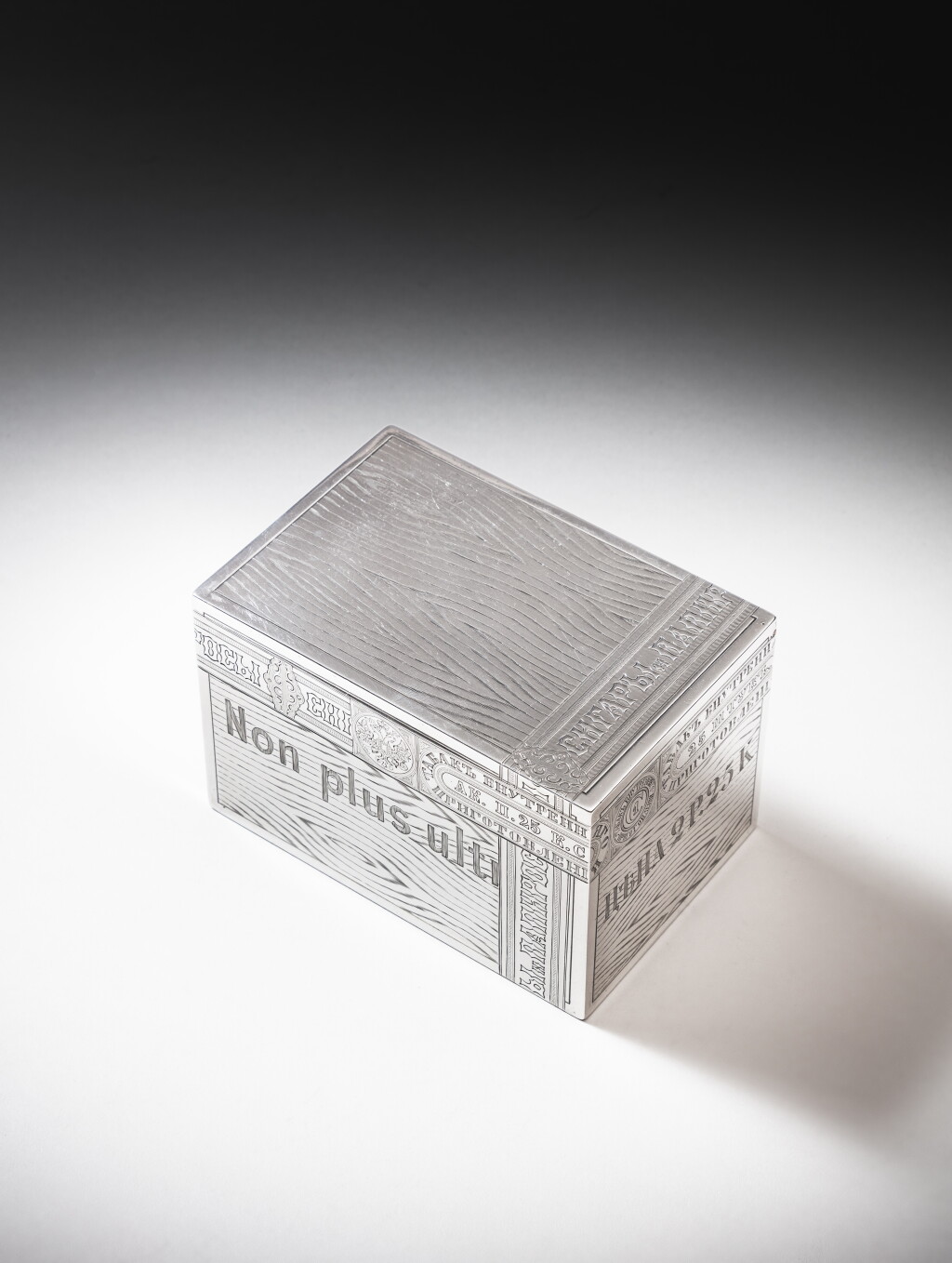 View full screen - View 1 of Lot 204. A parcel-gilt silver trompe l’oeil cigar box, Ovchinnikov, Moscow, 1871.