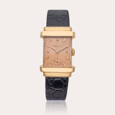 View full screen - View 1 of Lot 466. Reference 1450 ‘Top Hat Pink on Pink' | A pink gold rectangular wristwatch with pink dial, Circa 1945.