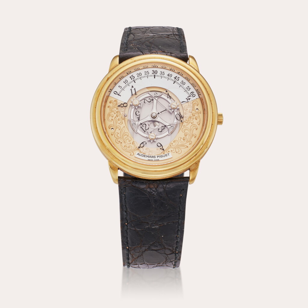 View full screen - View 1 of Lot 85. Reference 25720BA Star Wheel | A yellow gold automatic semi-skeletonized wristwatch with rotating discs display, Circa 1995.