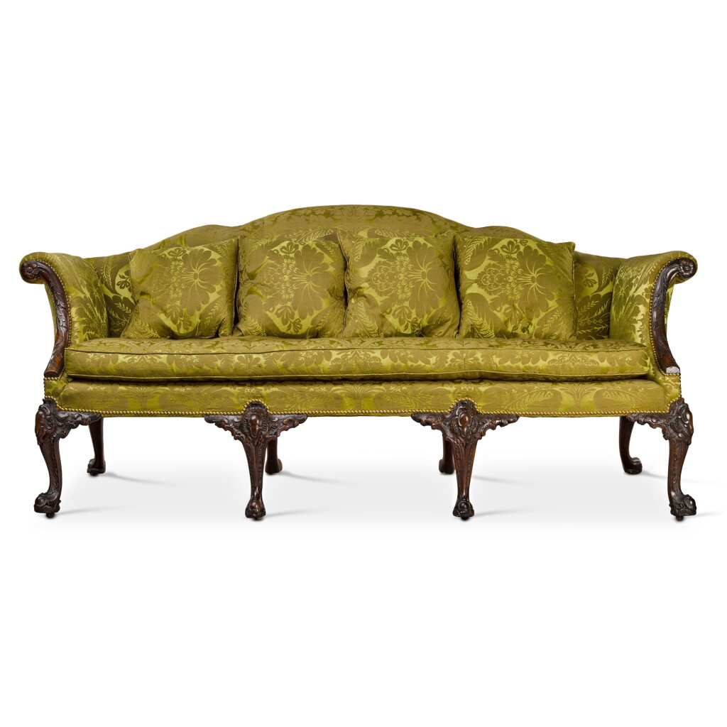View full screen - View 1 of Lot 99. A George II carved mahogany sofa, circa 1750.