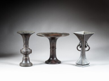 View full screen - View 1 of Lot 29. A group of three archaistic bronze vases (Gu), late Ming dynasty | 明末 銅出㦸花觚一組三件.