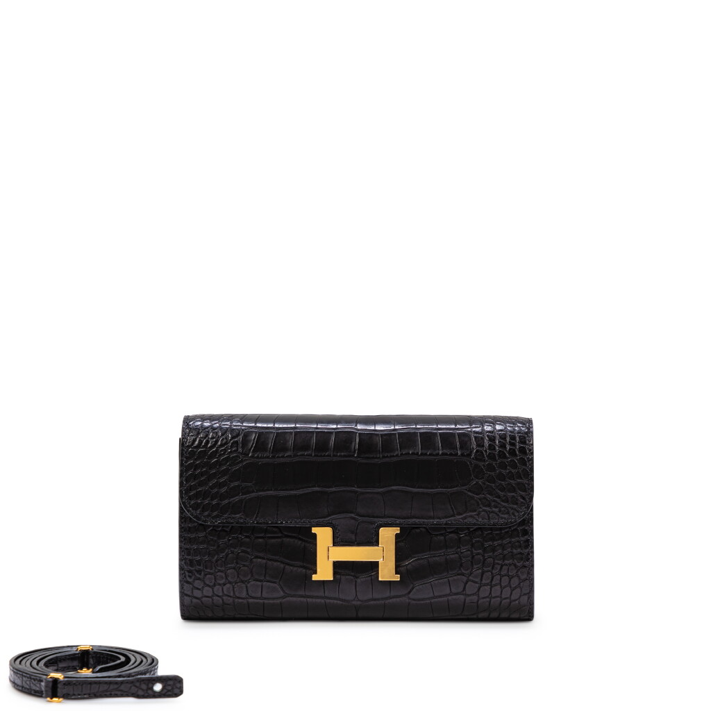 View full screen - View 1 of Lot 672. Hermès Black Alligator Mississippiensis Constance To Go Gold Hardware, 2022.