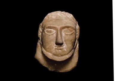 View full screen - View 1 of Lot 203. A SOUTH ARABIAN RELIEF HEAD OF A MAN, SABAEAN, 4TH/3RD CENTURY B. C..