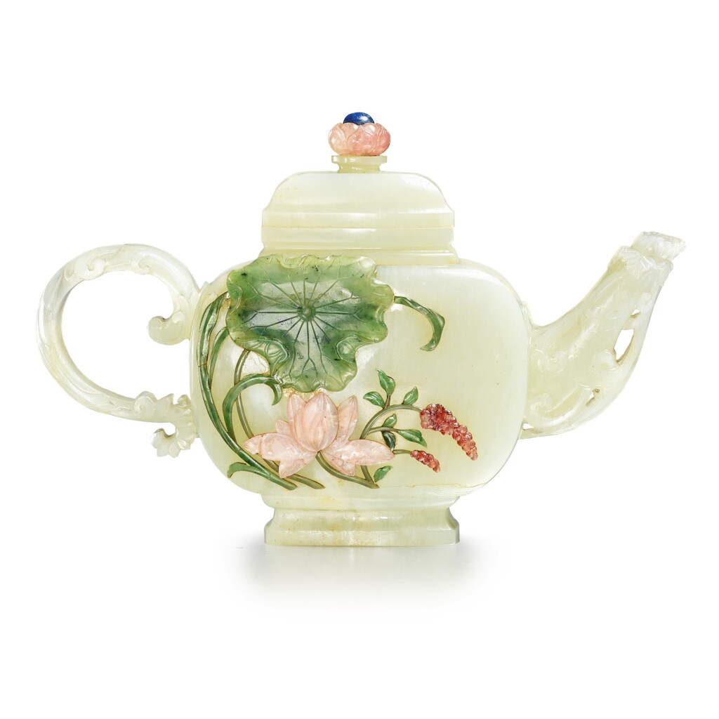 View full screen - View 1 of Lot 5. A hardstone-inlaid pale celadon jade teapot and cover, Qing dynasty, 18th / 19th century | 清十八 / 十九世紀 青白玉嵌寶蓮花圖茶壺.