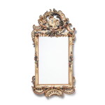 A South German carved polychrome-painted wood mirror, probably Bayreuth, circa 1750-1760