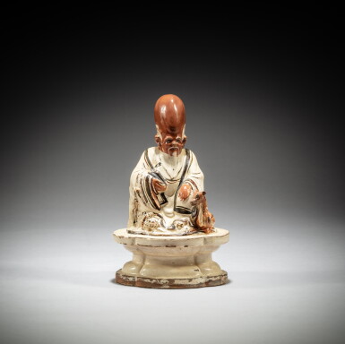View full screen - View 1 of Lot 65. A ‘Cizhou’ figure of Shoulao, Late Ming dynasty.