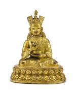 A GILT-BRONZE FIGURE OF A SHAMARPA LAMA, TIBET, 17TH CENTURY | 十七世紀 藏傳鎏金銅喇嘛坐像