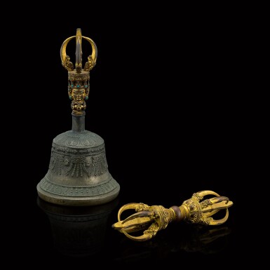 View full screen - View 1 of Lot 106. A rare parcel-gilt copper-alloy set of vajra and bell handle Ming dynasty, early 15th century | 明十五世紀初 局部鎏金銅金剛鈴柄及金剛杵一組兩件.