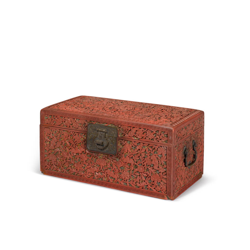 View full screen - View 1 of Lot 215. A carved cinnabar lacquer document box and cover, Qing dynasty, Qianlong period | 清乾隆 剔紅五福捧壽花卉紋書箱.
