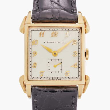 View full screen - View 1 of Lot 674. Retailed by Tiffany & Co.: A yellow gold wristwatch with Breguet numerals, Circa 1940.