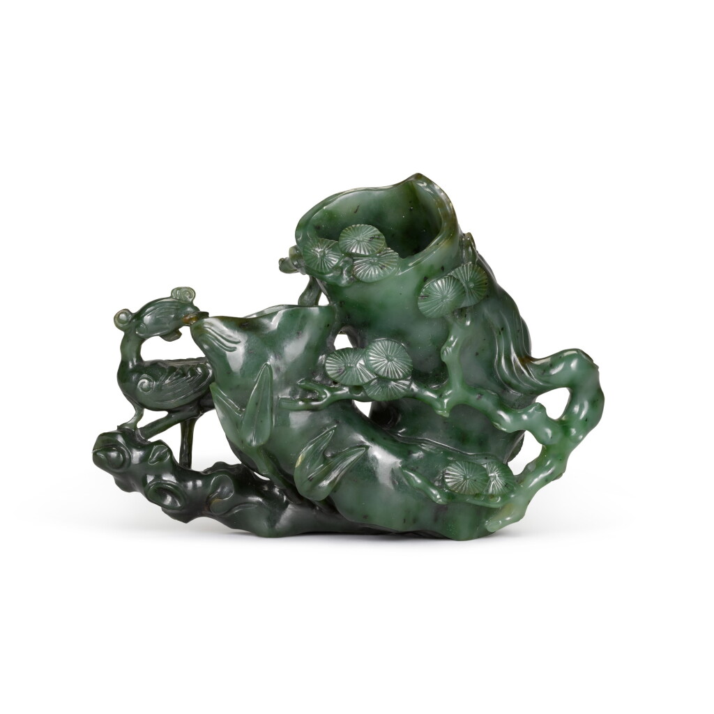 View full screen - View 1 of Lot 83. A spinach-green jade 'phoenix' double vase, Qing dynasty, Qianlong period | 清乾隆 碧玉鳳紋花插.