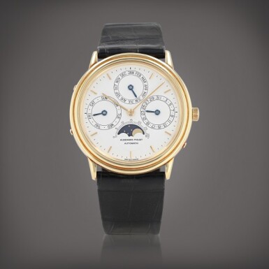 View full screen - View 1 of Lot 115. Montre bracelet en or jaune avec quantième perpétuel et phases de lune | Yellow gold perpetual calendar wristwatch with moon phases Vers 1980 | Circa 1980.