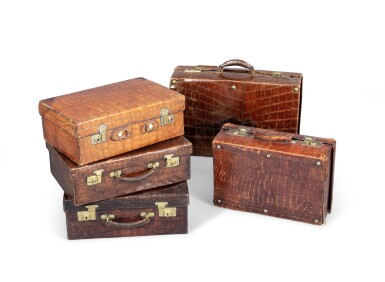 View full screen - View 1 of Lot 2071. Lot comprising five crocodile cases, mid 20th century | Lot comprenant cinq valises en crocodile, milieu du XXeme siècle.