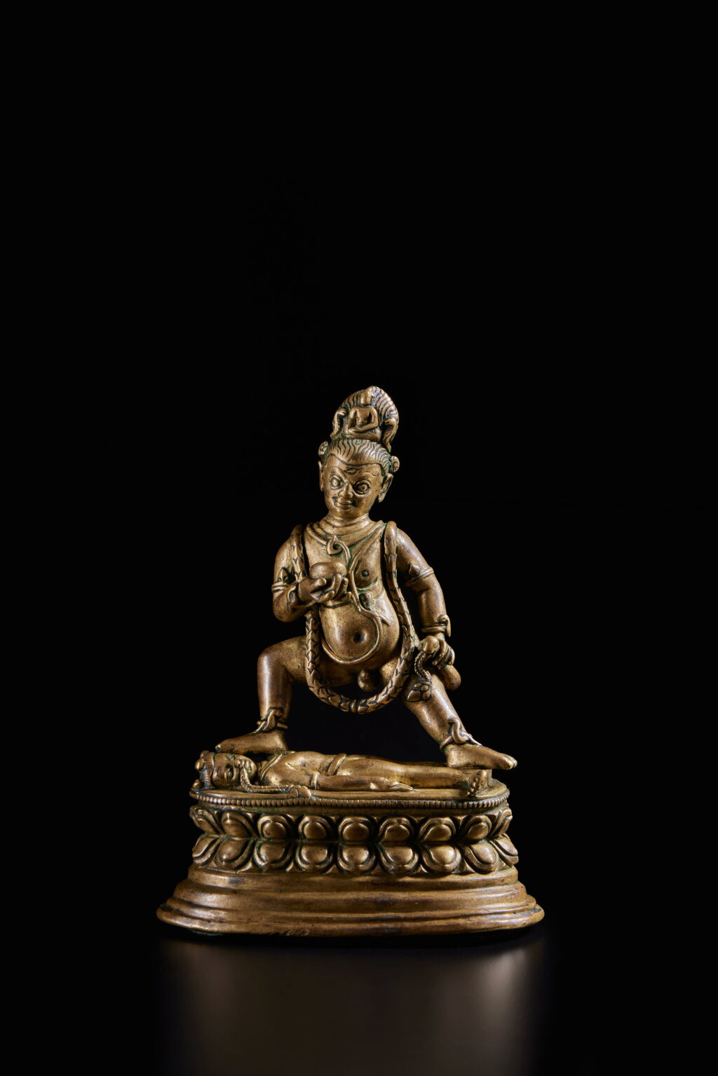 View full screen - View 1 of Lot 324. A copper alloy figure of Kalajambhala, Tibet, 12th / 13th century.