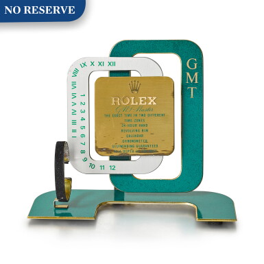 View full screen - View 1 of Lot 8007. ROLEX | GMT-MASTER A GILT BRASS AND GREEN ENAMEL RETAILER'S WINDOW DISPLAY, CIRCA 1960.