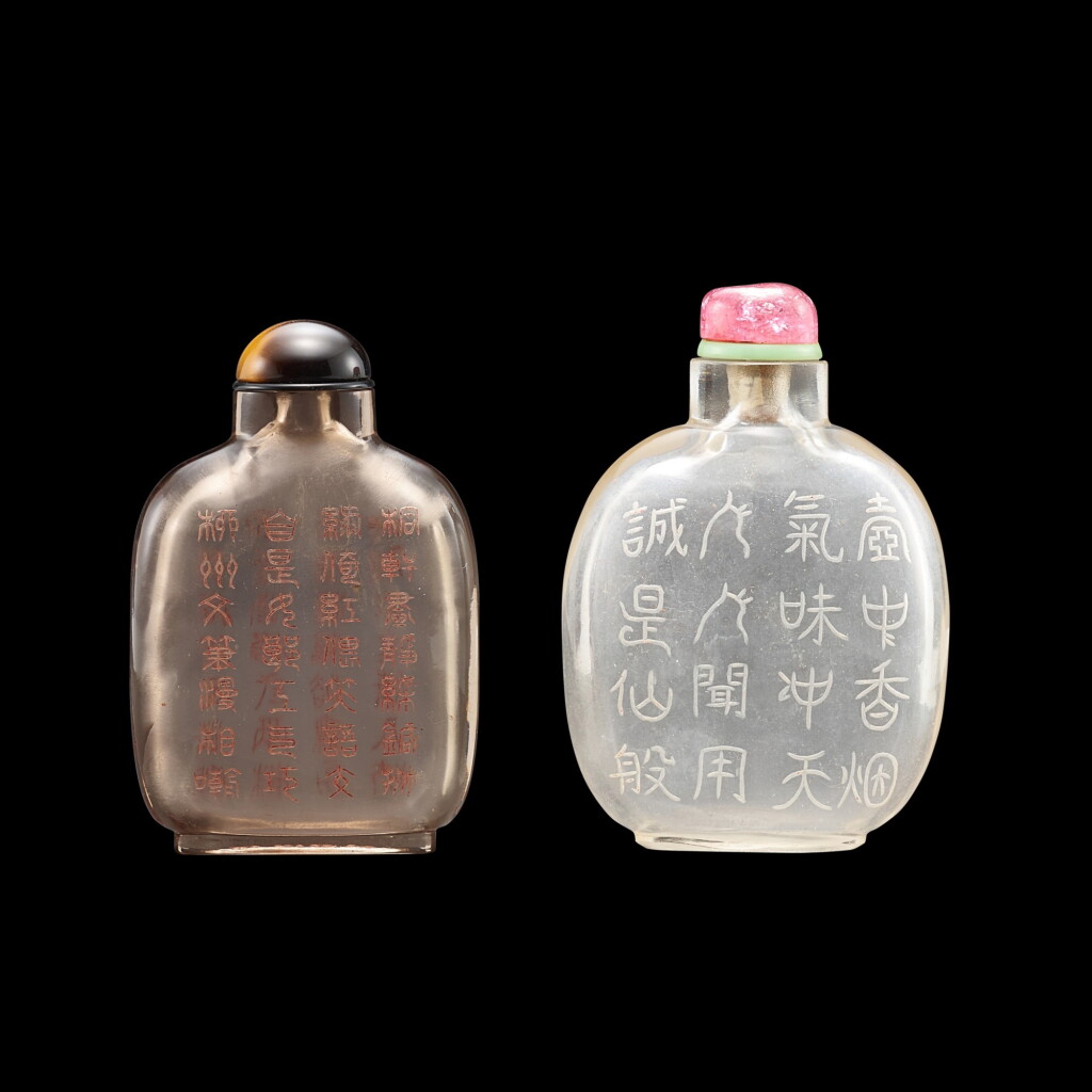 View full screen - View 1 of Lot 1049. Two inscribed glass snuff bottles, Qing dynasty, 19th century | 清十九世紀 透明料刻詩文鼻煙壺一組兩件.