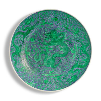 View full screen - View 1 of Lot 569. A massive blue-ground green-enameled 'Chuxiugong' 'dragon' charger, Qing dynasty, Guangxu period, circa 1889 | 清光緒 約1889年 青花地綠彩雲龍趕珠紋大盤 《儲秀宮製》款.