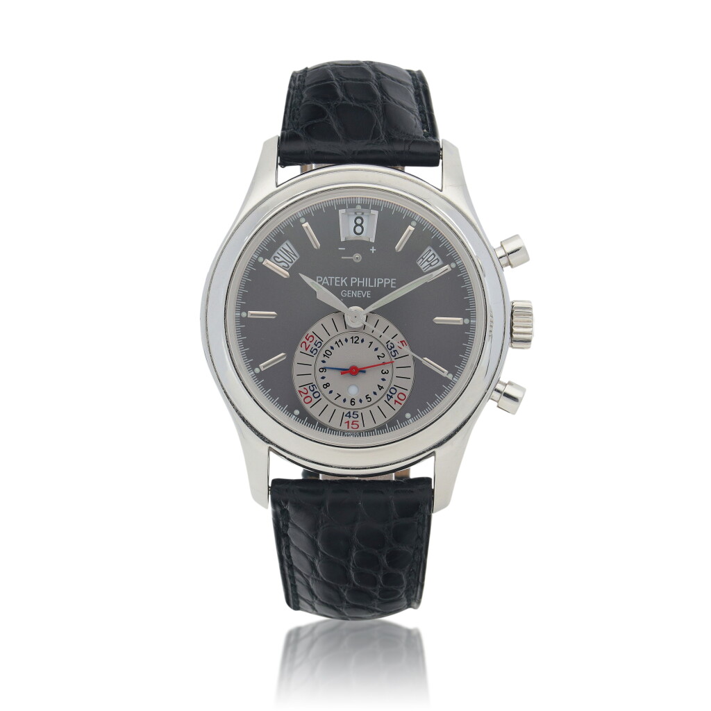 View full screen - View 1 of Lot 489. Ref. 5960P-001 Platinum annual calendar flyback chronograph wristwatch with power reserve and day/night indication Circa 2009.
