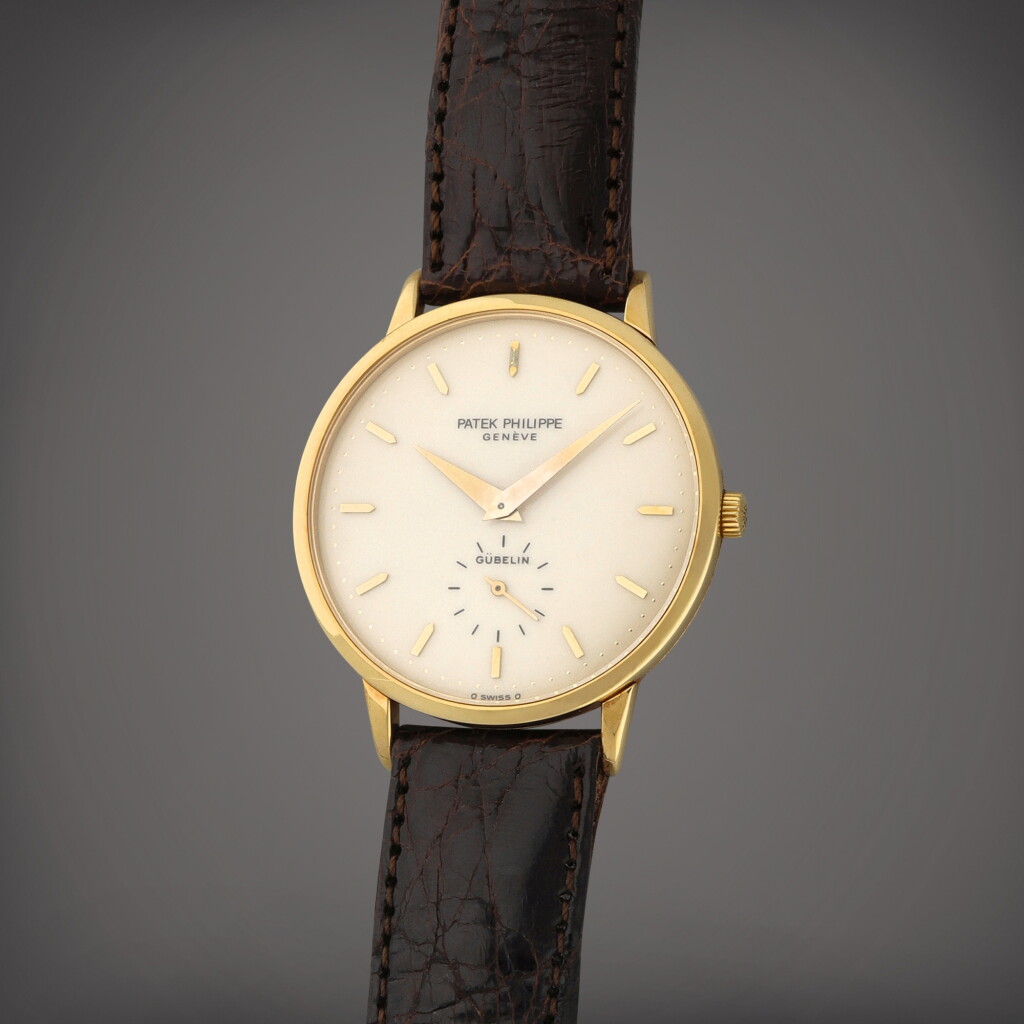 View full screen - View 1 of Lot 64. Retailed by Gübelin: Calatrava, Reference 3893 | A yellow gold wristwatch | Circa 1984.