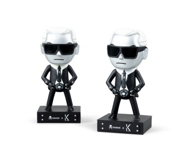 View full screen - View 1 of Lot 1164. Tokidoki, two figurines of Karl Lagerfeld designed by Simone Legno | Tokidoki, deux figurines à l'effigie de Karl Lagerfeld designées par Simone Legno.
