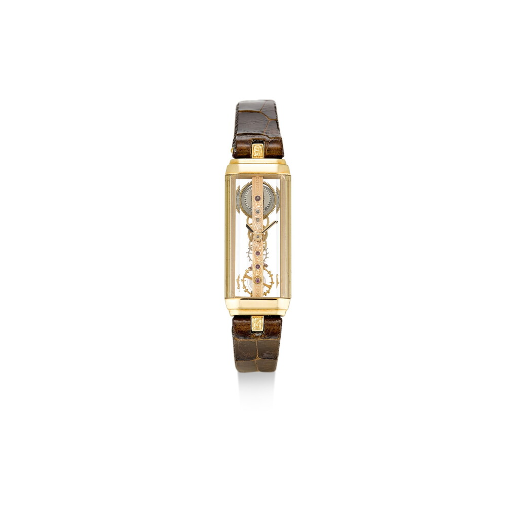 View full screen - View 1 of Lot 8253. CORUM | REFERENCE 1325056 A YELLOW GOLD SKELETONIZED WRISTWATCH, CIRCA 1999.