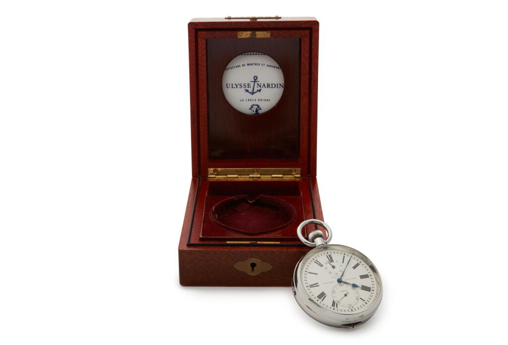 View full screen - View 1 of Lot 178. A large stainless steel open-faced watch with power reserve indication, Circa 1962.