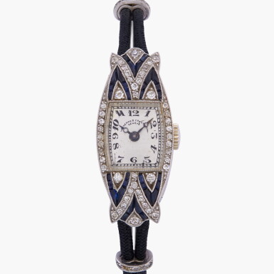 View full screen - View 1 of Lot 250. A diamond-set platinum wristwatch | Circa 1930.