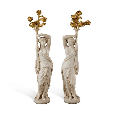 View full screen - View 1 of Lot 147. A Pair of French Gilt-Bronze Mounted White Marble Figural Four-Light Torchères, After Jean-Joseph Foucou, 19th Century .