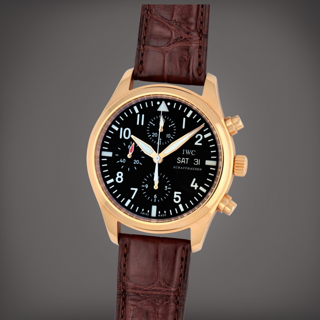 View full screen - View 1 of Lot 422. Pilot's Watch, Reference 371713 | A pink gold chronograph wristwatch with day and date | Circa 2009.