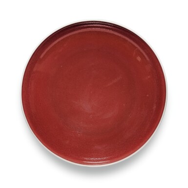 View full screen - View 1 of Lot 192. A COPPER-RED GLAZED SAUCER DISH KANGXI MARK AND PERIOD | 清康熙 霽紅釉盤 《大清康熙年製》款.