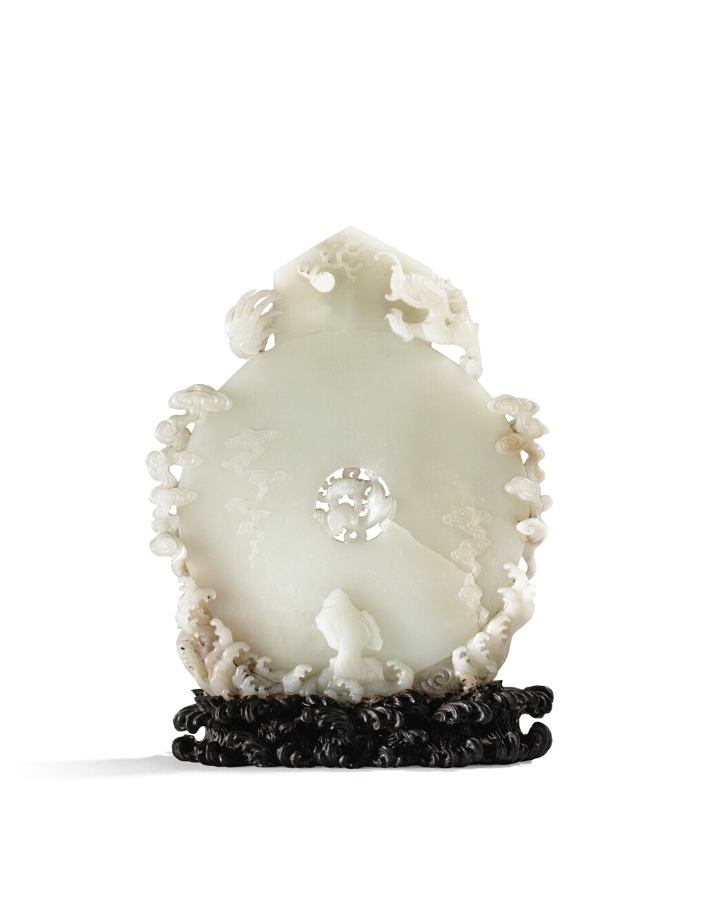 View full screen - View 1 of Lot 59. RARE DISQUE DE STYLE ARCHAÏSANT EN JADE CÉLADON PÂLE, GUIBI DYNASTIE QING, ÉPOQUE QIANLONG | 清乾隆 青白玉雕雲龍趕珠紋圭璧 | A very rare archaistic pale celadon jade disc, guibi, Qing Dynasty, Qianlong period.
