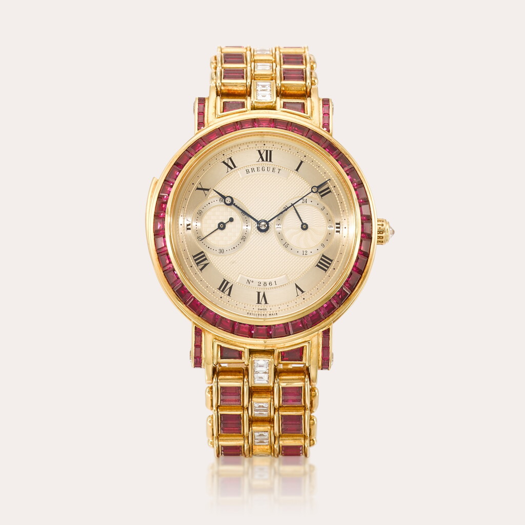 View full screen - View 1 of Lot 10. A magnificent, large and heavy special order 18ct yellow gold, ruby- and diamond-set minute repeating bracelet watch.
