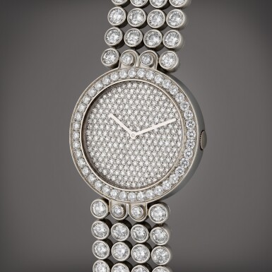 View full screen - View 1 of Lot 74. Premier | A platinum and diamond-set automatic bracelet watch, Circa 1995.