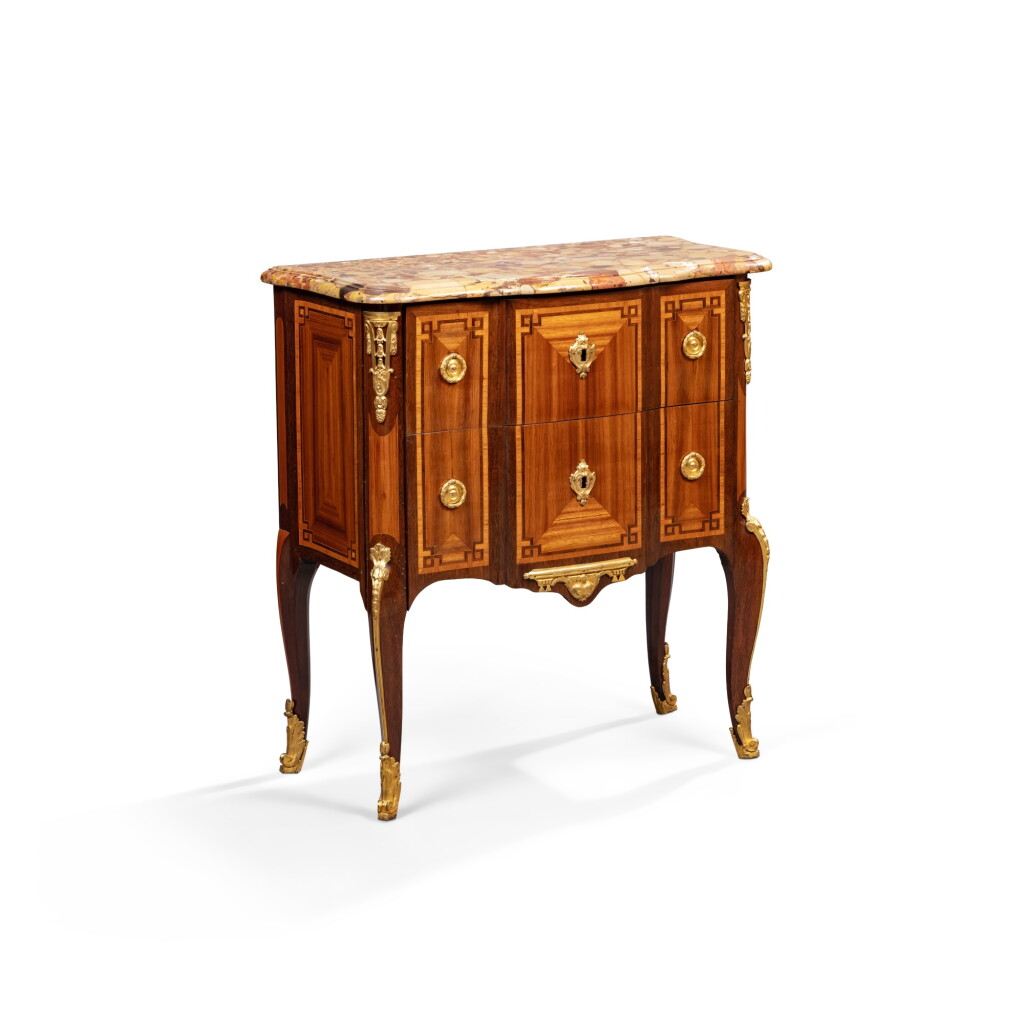 View full screen - View 1 of Lot 797. A late Louis XV gilt-bronze-mounted tulipwood, amaranth and bois satiné commode, circa 1770, by François Rubestück.
