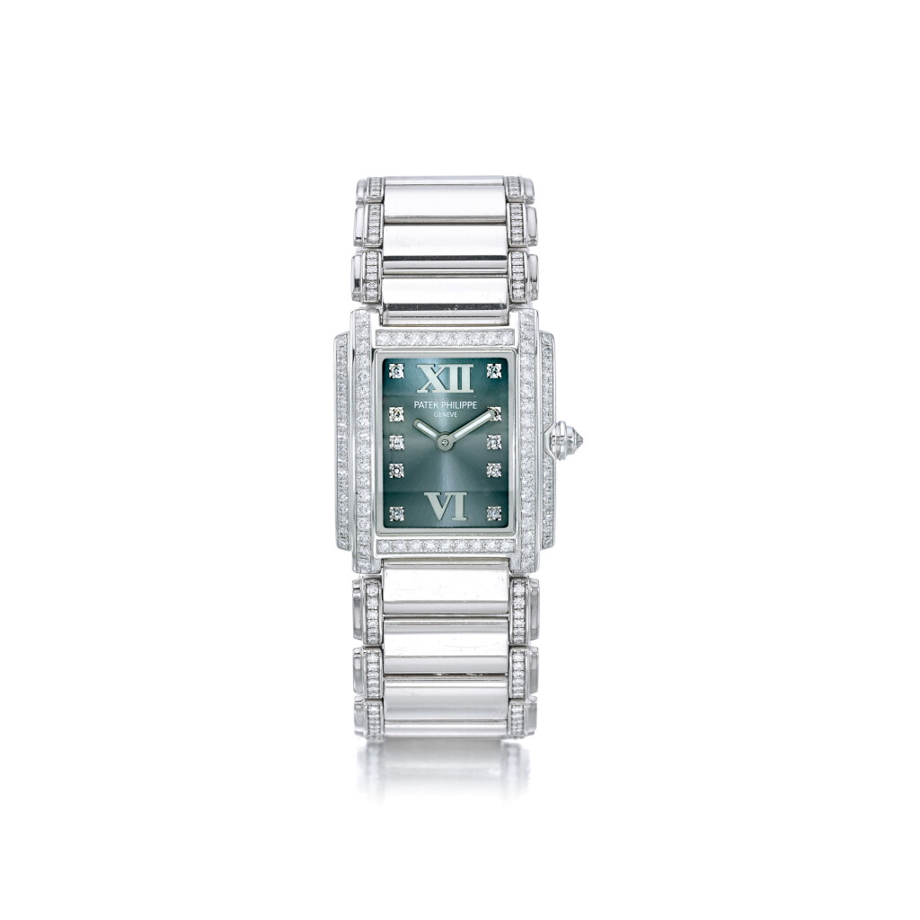 View full screen - View 1 of Lot 891. PATEK PHILIPPE | REF 4908/310G-001 TWENTY-4, A WHITE GOLD AND DIAMOND-SET WRISTWATCH WITH BRACELET, CIRCA 2005 | 百達翡麗 | 4908/310G-001型號「TWENTY-4」白金鑲鑽石鍊帶腕錶,年份約2005.
