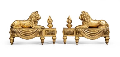 View full screen - View 1 of Lot 123. A pair of gilt-bronze fire-dogs, late 18th century - early 19th century | Paire de chenets au lion en bronze doré de la fin du XVIIIème - début du XIXème siècle.