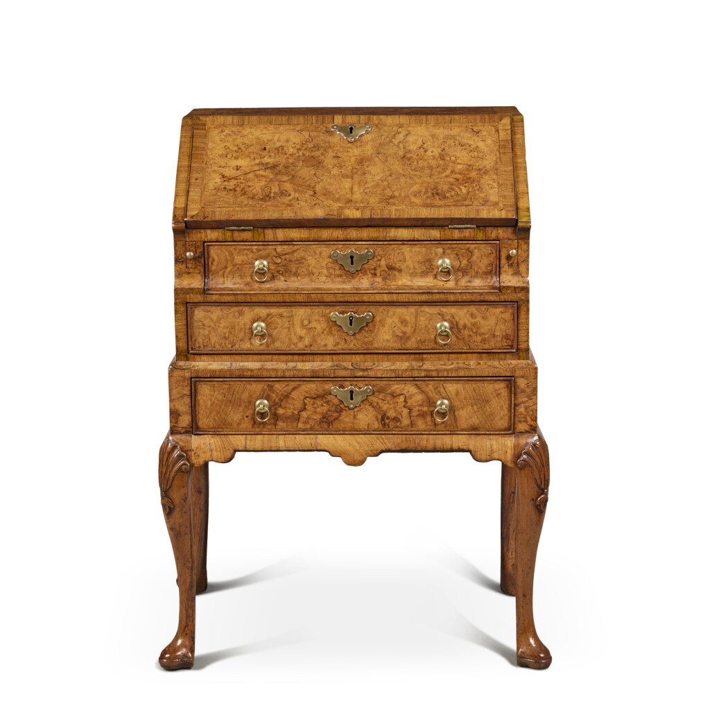 View full screen - View 1 of Lot 16. A George I Brass-Mounted Burr Walnut Small Bureau on Stand, Circa 1725.