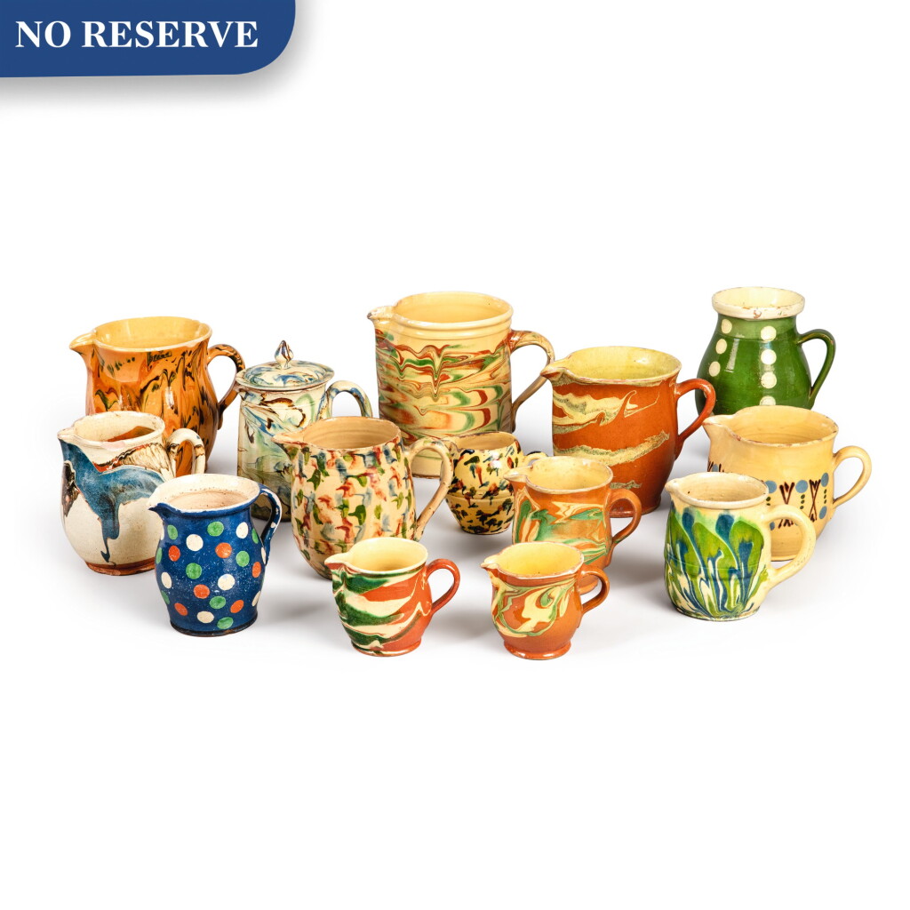 View full screen - View 1 of Lot 377. Group of Fourteen Pottery Pitchers and Creamers, Probably French, 19th Century.