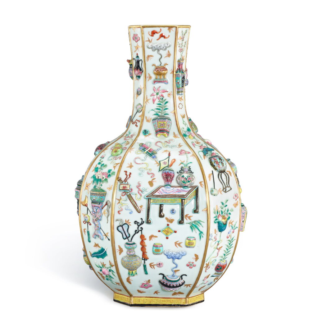 View full screen - View 1 of Lot 452. A famille-rose applique-decorated 'hundred antiques' octagonal vase, Qing dynasty, 19th century 清十九世紀 粉彩貼清供紋八方瓶.