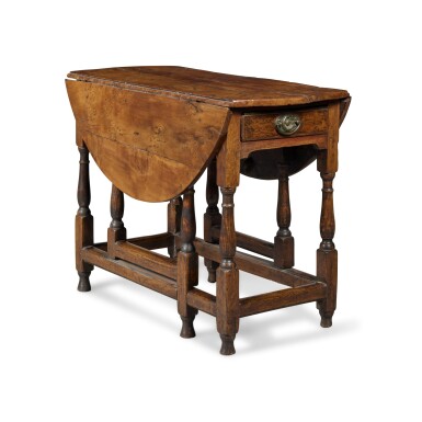 View full screen - View 1 of Lot 52. A George II Yewwood Oval Drop-Leaf Gate-Leg Table, Mid-18th Century.