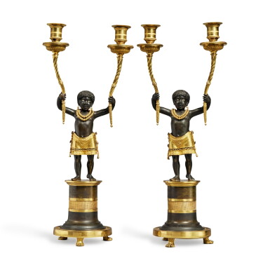 View full screen - View 1 of Lot 1032. A Pair of Directoire Gilt and Patinated Bronze Two-Light Figural Candelabra, Circa 1800.