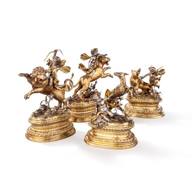 View full screen - View 1 of Lot 238. A set of four German silver-gilt figural groups with putti and animals, Abraham II Drentwett, 1699-1703.