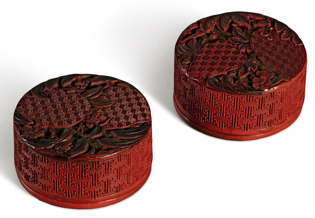 View full screen - View 1 of Lot 109. A PAIR OF CARVED POLYCHROME LACQUER BOXES AND COVERS QING DYNASTY, QIANLONG PERIOD | 清乾隆 剔彩瑞果紋圓蓋盒一對.