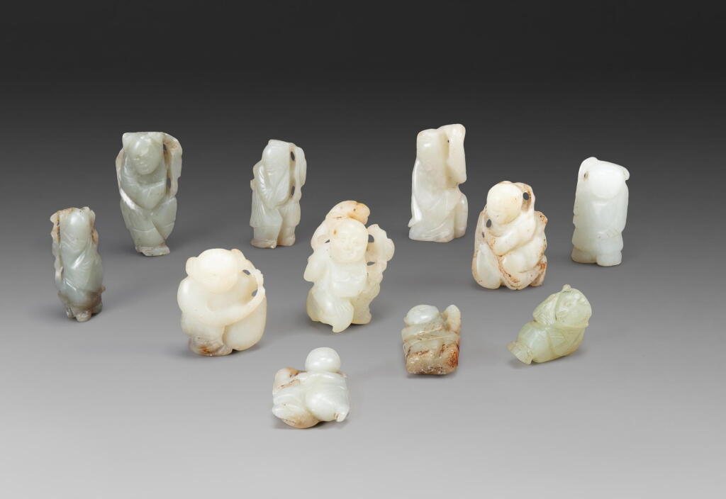 View full screen - View 1 of Lot 205. A group of eleven celadon jade 'boy' carvings Qing dynasty | 清 青白玉童子把件一組十一件.