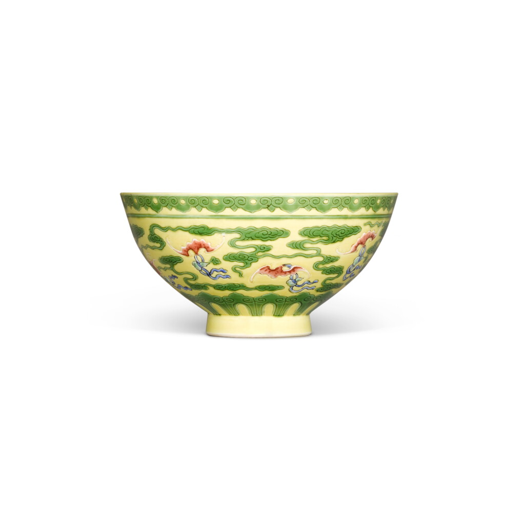 View full screen - View 1 of Lot 259. A rare yellow-ground green-enameled famille-rose 'bats and cloud' bowl, Mark and period of Yongzheng.