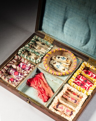 View full screen - View 1 of Lot 47. A French Empire mahogany, mahogany veneered, ebony, ivory and bone games box, attributed to Martin-Guillaume Biennais, probably belonging to Emperor Napoleon I in Fontainebleau.